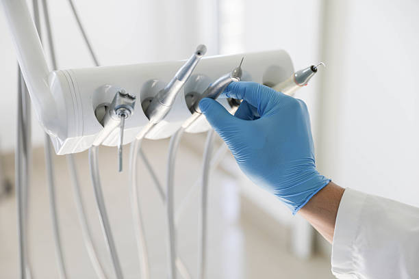 Professional Emergency Dentist technician working in Verdigris, OK